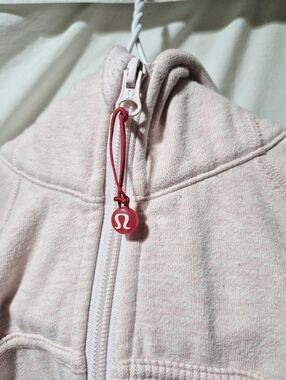 lululemon athletica Kids' Light Pink Hooded Zip Jacket with Red Logo Pull
